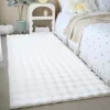 Rabbit fur rug is soft, thick, non-slip, waterproof, machine washable, perfect for living room and bedroom.