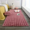 Rabbit fur rug is soft, thick, non-slip, waterproof, machine washable, perfect for living room and bedroom.