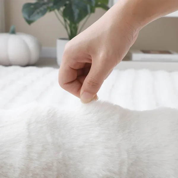 Rabbit fur rug is soft, thick, non-slip, waterproof, machine washable, perfect for living room and bedroom.