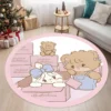 Round pink polka dot carpet with cartoon cats for living room and bedroom, with cute cat patterns.
