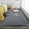 Rabbit fur rug is soft, thick, non-slip, waterproof, machine washable, perfect for living room and bedroom.