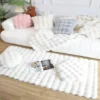 Rabbit fur rug is soft, thick, non-slip, waterproof, machine washable, perfect for living room and bedroom.