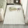 Rabbit fur rug is soft, thick, non-slip, waterproof, machine washable, perfect for living room and bedroom.