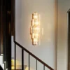 S26b4aad20ce942f8bf60a98f9ba641adq.webp Modern Crystal Wall Lamp 3-Layer Wall Crystal Sconce Light E14 Led Corn Lights