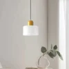 S45b217cc0fc04b7e8a4da864021aa232O.webp Nordic Modern Glass Bedroom Bedside Long Line Small Chandelier Restaurant Bar