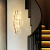 S9213b87210ef42838066e2bfc2bd3f0ey.webp Modern Crystal Wall Lamp 3-Layer Wall Crystal Sconce Light E14 Led Corn Lights